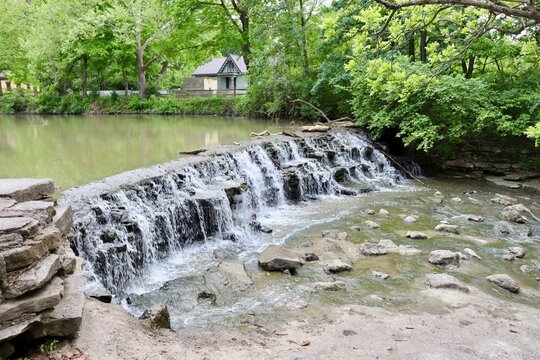 The peaceful waterfall in the woods.