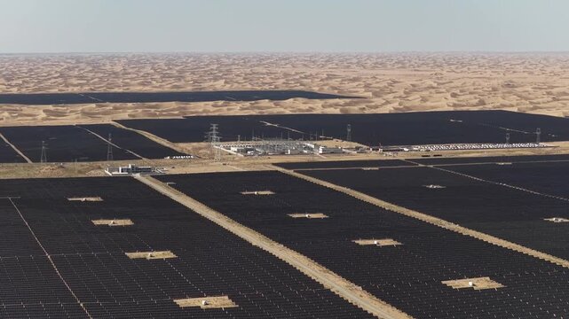 Aerial View of Utility-Scale Solar Farm with Battery Energy Storage System in Arid Desert