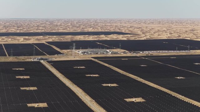 Aerial View of Utility-Scale Solar Farm with Battery Energy Storage System in Arid Desert