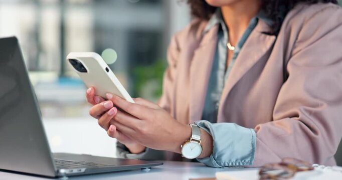 Phone, laptop and hands of businesswoman in office with email update on finance report planning. Typing, technology and financial advisor with cellphone for texting feedback on investment growth.