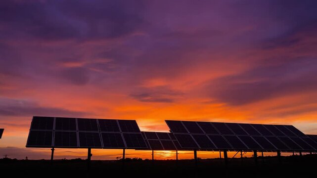 Cinematic silhouette of solar panel farm against a vibrant purple sunset sky, alternative energy generation