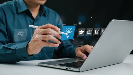 Fototapeta premium Professional using digital stylus selecting AI education icons on laptop