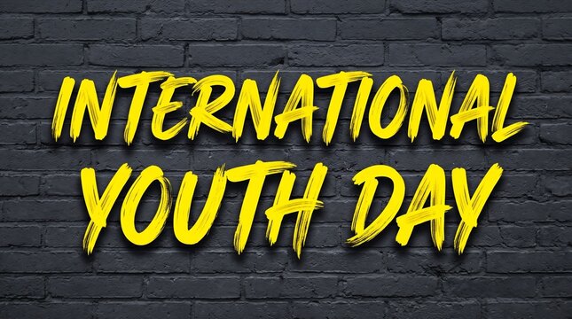 International Youth Day yellow typography on black brick wall, urban graffiti style celebration banner, gritty street art background