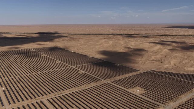 Aerial View of Utility-Scale Solar Farm with Battery Energy Storage System in Arid Desert