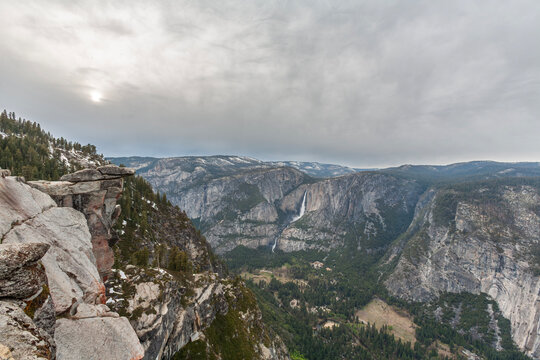 Beautiful scenic view of Yosemite Valley canyon and waterfalls from Glacier Point cliff