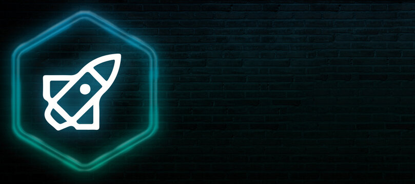 Neon Glowing Rocket Launch Icon on Dark Brick Wall Banner for Cloud Deployment