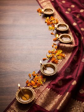 Silk Textile and Diya Luxury Flat Lay for Diwali Social Media Marketing Background