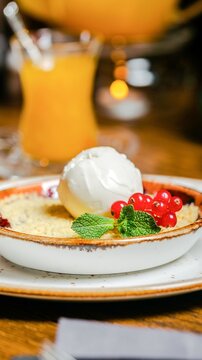 Close up of gourmet breakfast spread featuring fresh berries and whipped cream on toast point, perfect for brunch time setting, vibrant morning meal photography