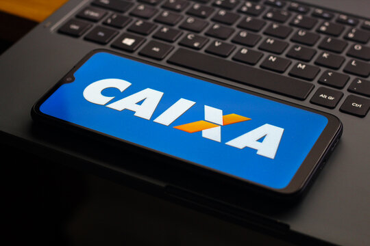 In this photo illustration, the Caixa Econ&ocirc;mica Federal (CEF) logo is seen displayed on a smartphone screen.