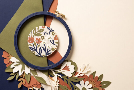 Embroidery hoop with floral textile paper-cut motif