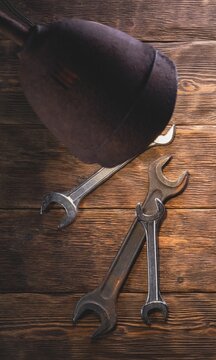Vintage Corkscrew and Wine Bottle with Cork, Antique Metal Wine Opener Isolated on White Background, Classic Bar Tool and Vintage Kitchen Equipment