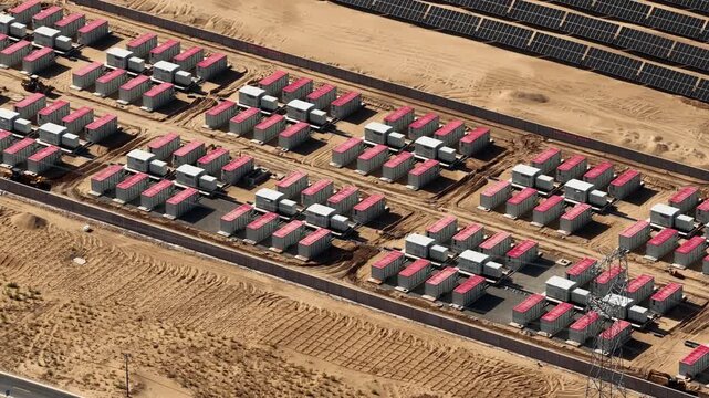 Aerial View of Utility-Scale Solar Farm with Battery Energy Storage System in Arid Desert