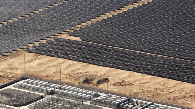 Aerial View of Utility-Scale Solar Farm with Battery Energy Storage System in Arid Desert