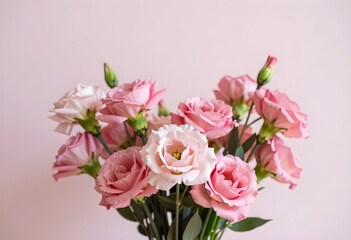 Fototapeta premium Pink eustoma flowers bouquet with delicate petals and green stems against a soft pastel background, elegant floral arrangement