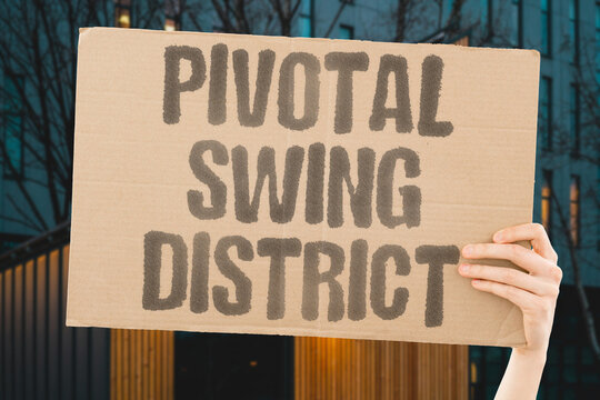 "Pivotal Swing District" A pivotal swing district becomes the focus of national political attention. SWING. DISTRICT. PIVOTAL. NATIONAL. ATTENTION.