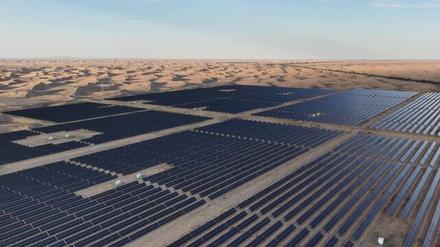 Aerial View of Utility-Scale Solar Farm with Battery Energy Storage System in Arid Desert