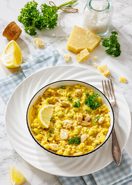 Creamy chicken and yellow rice bowl on a table