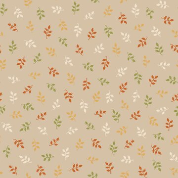 Autumn seamless botanical pattern with colorful leafy branches in orange, mustard, olive green and cream on beige background.