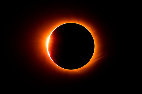 Total Solar Eclipse with Solar Corona Visible in Dark Night Sky