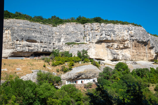 The monastery in the rocks on a clear, sunny day. Nature, landscape, world tourism.