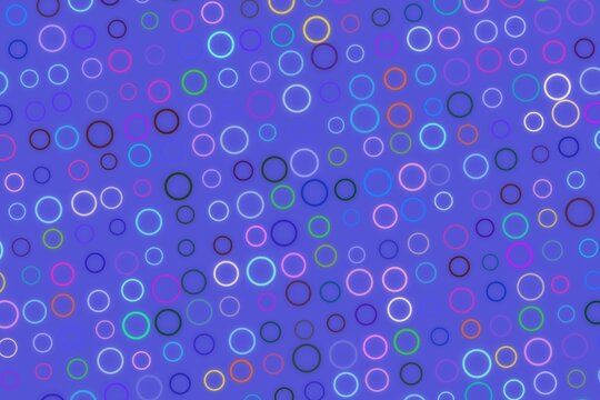 Colorful bokeh circles on purple background for design