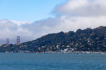 Fototapeta premium View from Belvedere across San Francisco Bay to Sausalito Golden Gate Bridge towers and marina