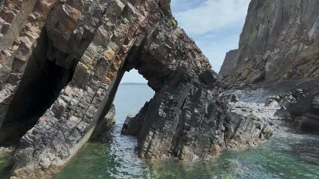 Blackchurch Rock and Cliffs over Mouthmill Beach from a drone, North Devon Coast, Devon, England
