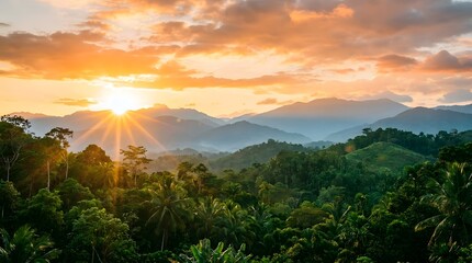 Naklejka premium Stunning golden sunrise over a lush tropical rainforest mountain landscape