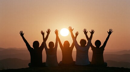 Fototapeta premium The Silhouetted Group of Friends Celebrating at Sunset on a Distant Horizon