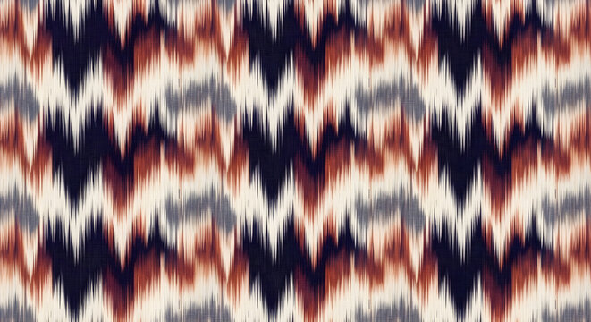 Ikat tribal pattern seamless design- zigzag chevron textile texture in indigo rust and cream colors