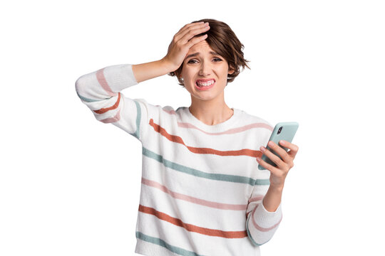 Photo of sad young lady wear striped sweater holding modern gadget arm head isolated grey color background