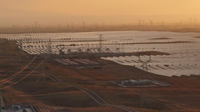 Aerial View of Utility-Scale Solar Farm with Battery Energy Storage System in Arid Desert