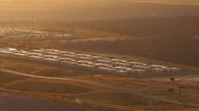Aerial View of Utility-Scale Solar Farm with Battery Energy Storage System in Arid Desert