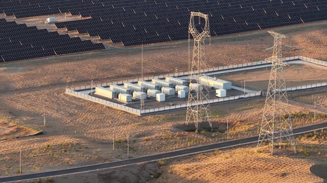 Aerial View of Utility-Scale Solar Farm with Battery Energy Storage System in Arid Desert