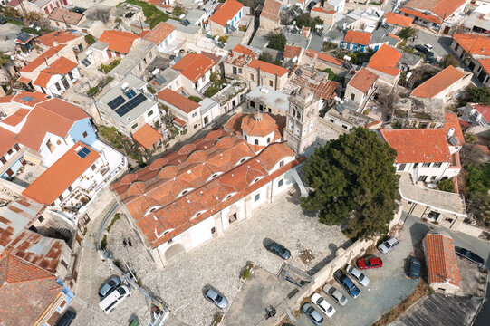 Captivating aerial view showcasing the traditional architecture and vibrant red roofs of Pano Lefkara village in Cyprus, highlighting its historical charm. Larnaca District, Cyprus