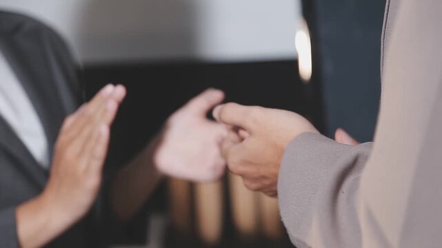 Group of asian businesspeople clapping hands congratulation.