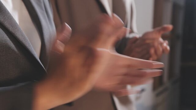 Group of asian businesspeople clapping hands congratulation.