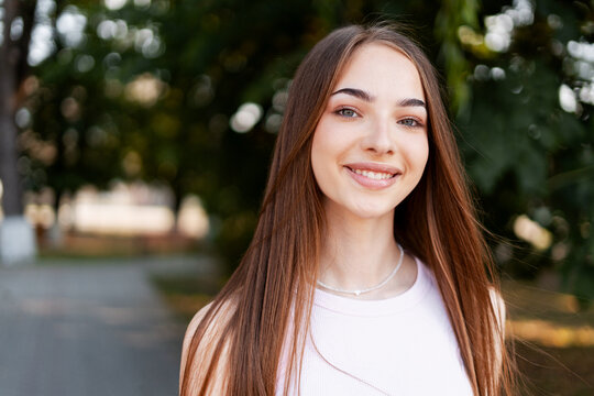 Portrait of smiling young woman outdoors