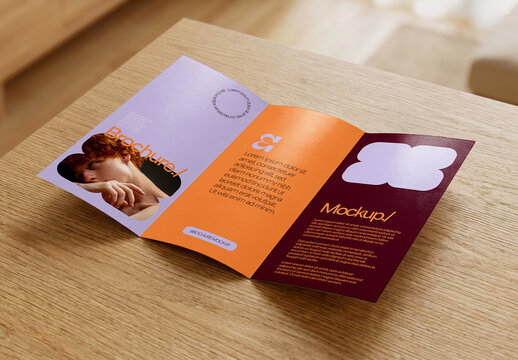 Trifold Brochure on Wood Mockup
