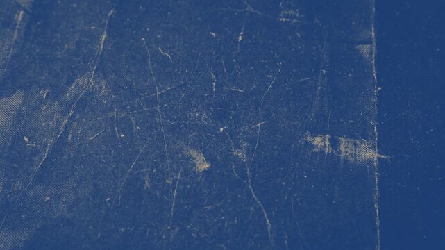 Dark blue vintage grunge paper background with subtle scratch lighting and weathered surface fold texture 4k video