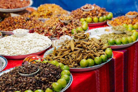 Mexican market table with edible insect