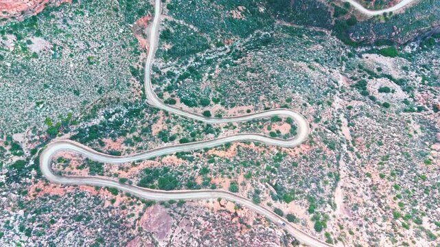 Aerial of winding dirt road mountain pass, Swartberg pass, South Africa