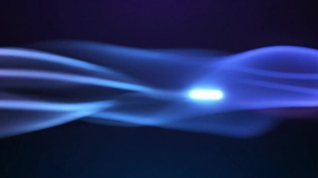 Abstract flowing energy plasma effect, swirling vibrant purple and blue light on dark background