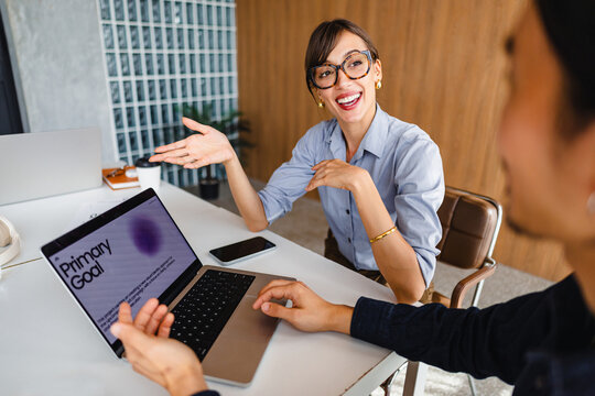 Meeting Between Two People in an Office Discussing a Project Goal