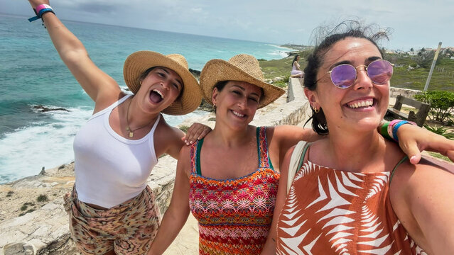 Three friends enjoying vacation trip on Mexico coastline