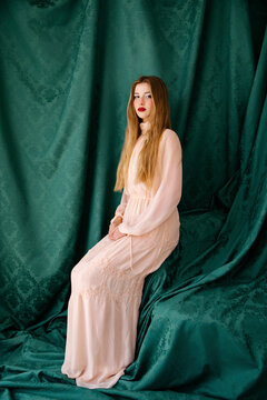 Woman in flowing pink dress