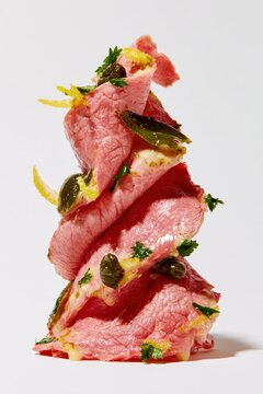 Vitello Tonnato Close Up Stack on White Background