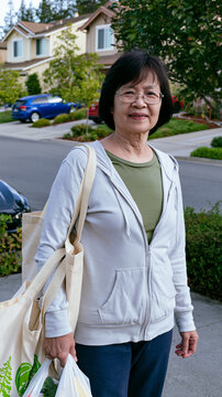 Healthy Asian Senior Woman Enjoying an Active and Independent Lifestyle