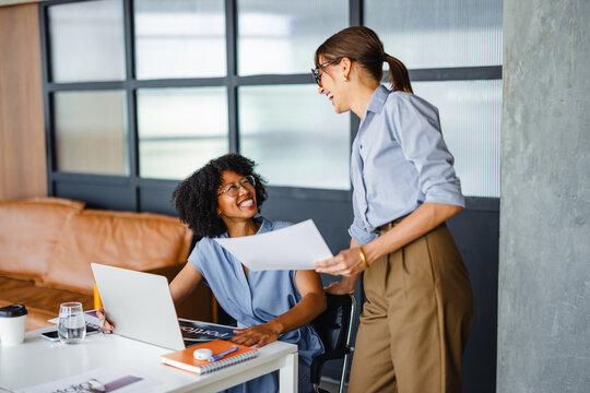 Women Working Together in an Office During the Day