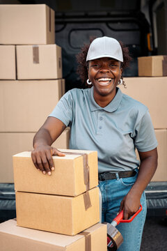 African american woman working with delivery packages
